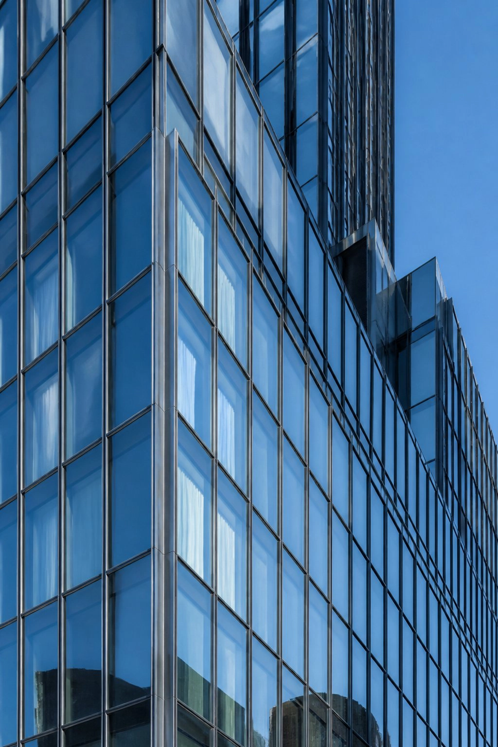 Local Law 11 Masonry Contractors NYC FISP Cycle 10 facade repair for Manhattan glass curtain wall high-rise